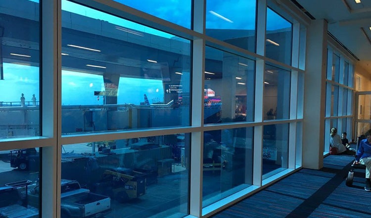 dynamic glass windows in airport terminal