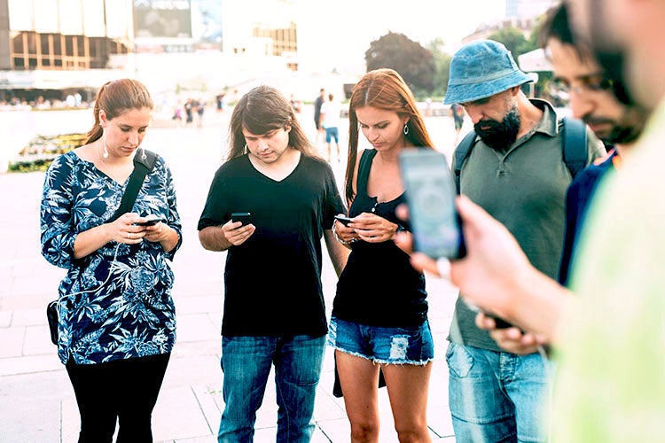 students with cell phones