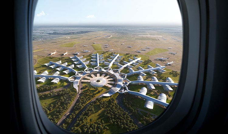 A view of the airport through the window of an airplane