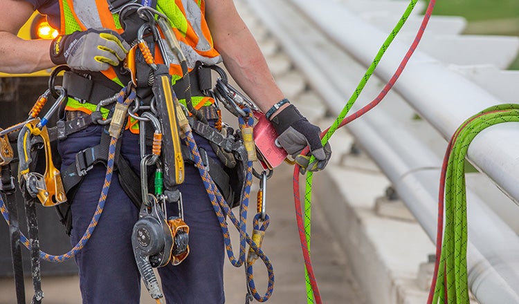 Rope inspection gear on belt of inspector
