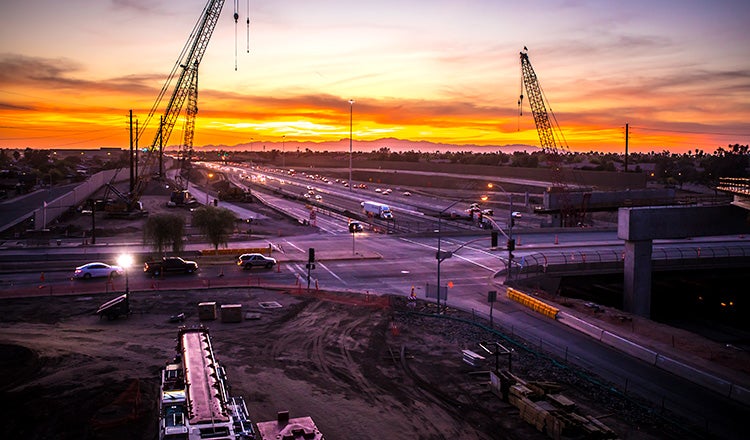 South Mountain Freeway construction at sunset
