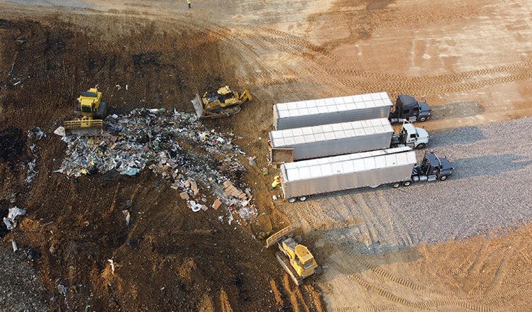 Truck hauling from landfill