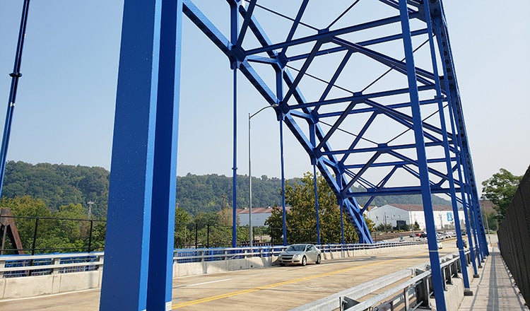 Car on Jerome Street bridge