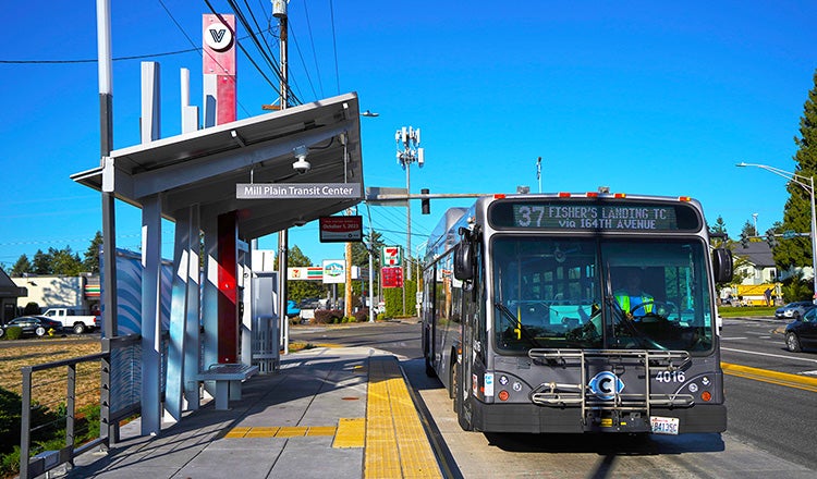 Bus stopped at brt shelter