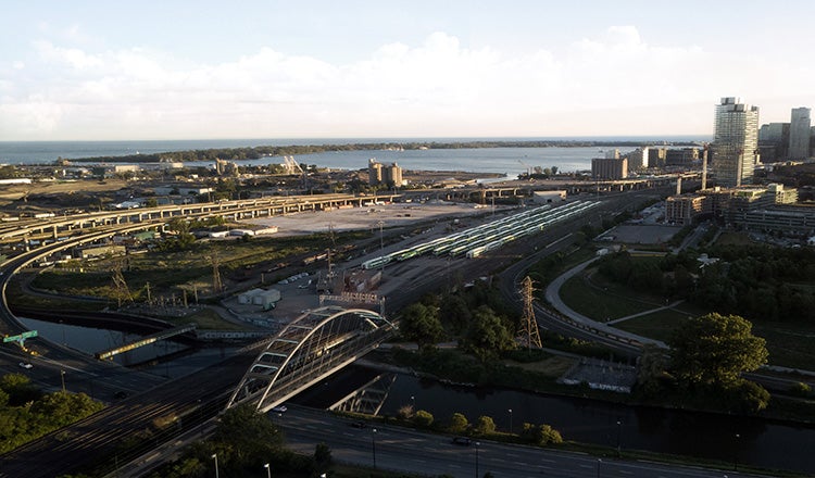 rendering of Lower Don bridge with Toronto skyline in background