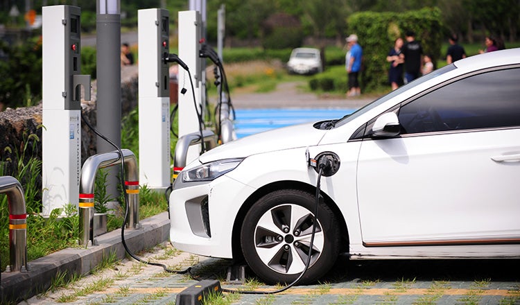 car parked at electric vehicle charger