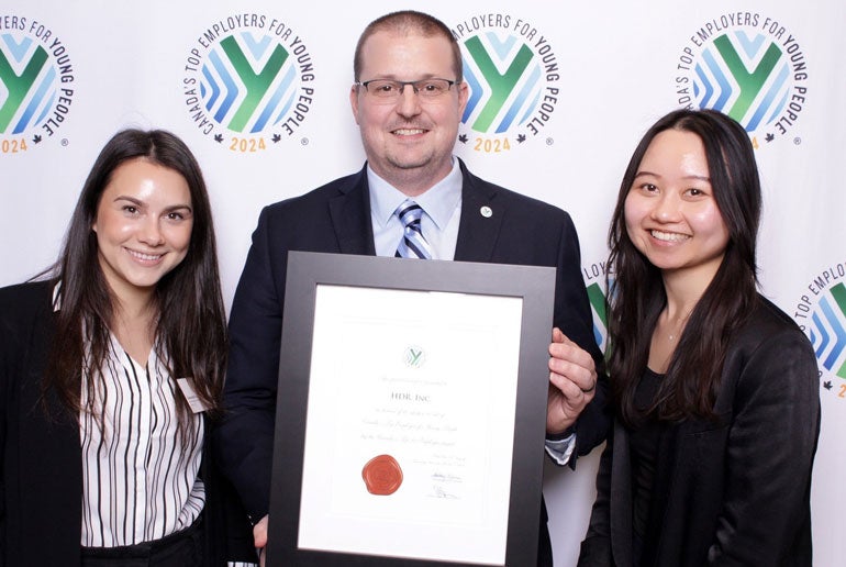 Canada staff receiving top young people award