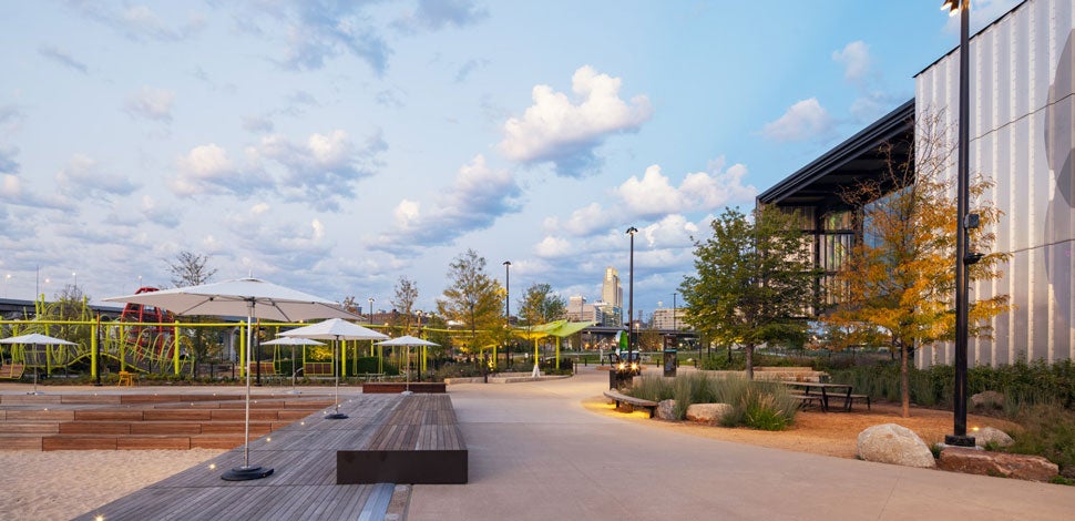 View of a museum in a park at sunset