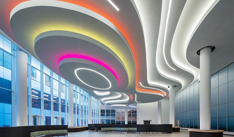 Lobby and atrium of Hubbard Center, Omaha, Nebraska, USA. Innovative ceiling lighting design.