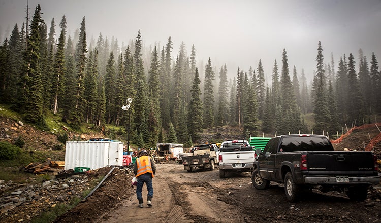 A person walks near a mine