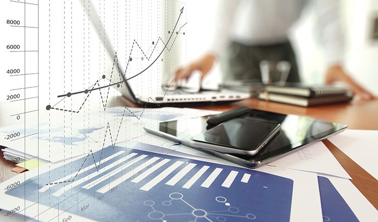 finance charts on table
