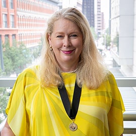 Sandy Tkacz with Fellowship Medal at ACHA Luncheon