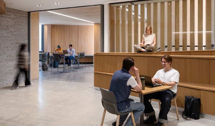Students studying at Queens University