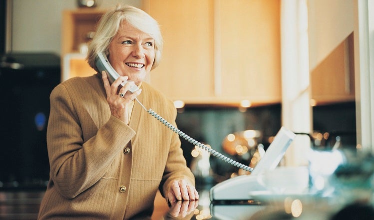 Stock photgraphy showing a woman on the phone