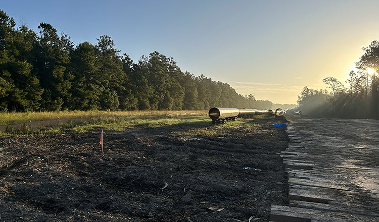 Pipeline construction at sunset
