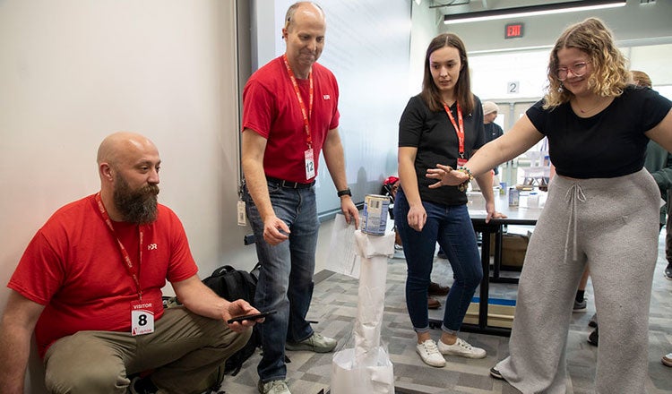 HDR employees at a STEM event with students