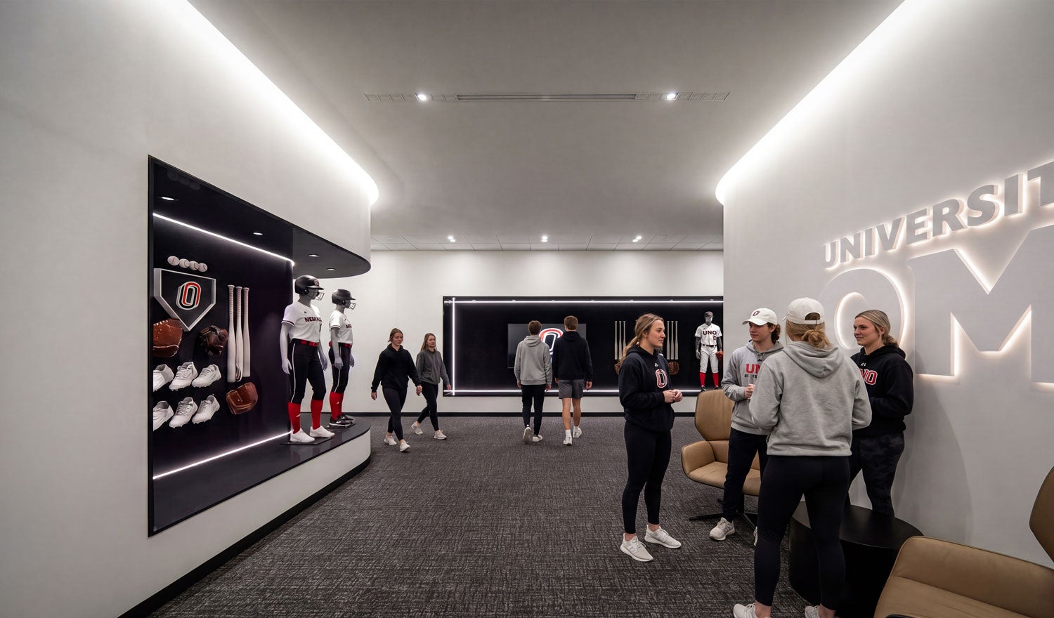 Rendering of students standing in the lobby of the University of Nebraska athletics clubhouse